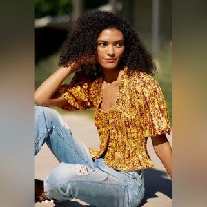 Anthropologie Love The Label Gold and Maroon Abstract Smocked Blouse, size M.